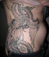tribal phoenix pic tattoo on rib
